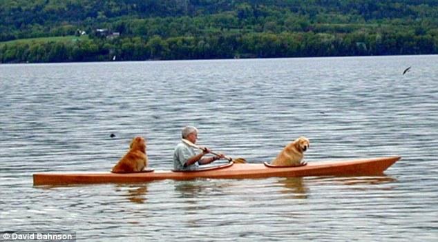 david bahnson kayaking with his 2 dogs