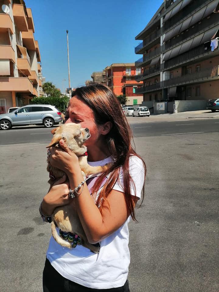 silvia hugging lost dog maya