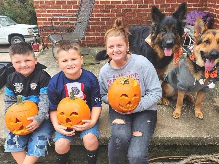 family and the dogs at halloween