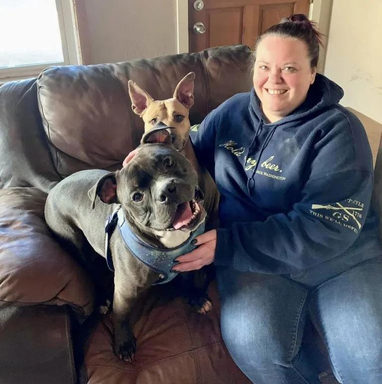 arlo and woman on couch