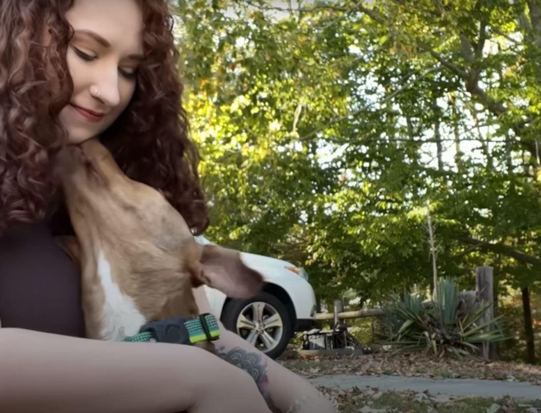 woman and adopted puppy