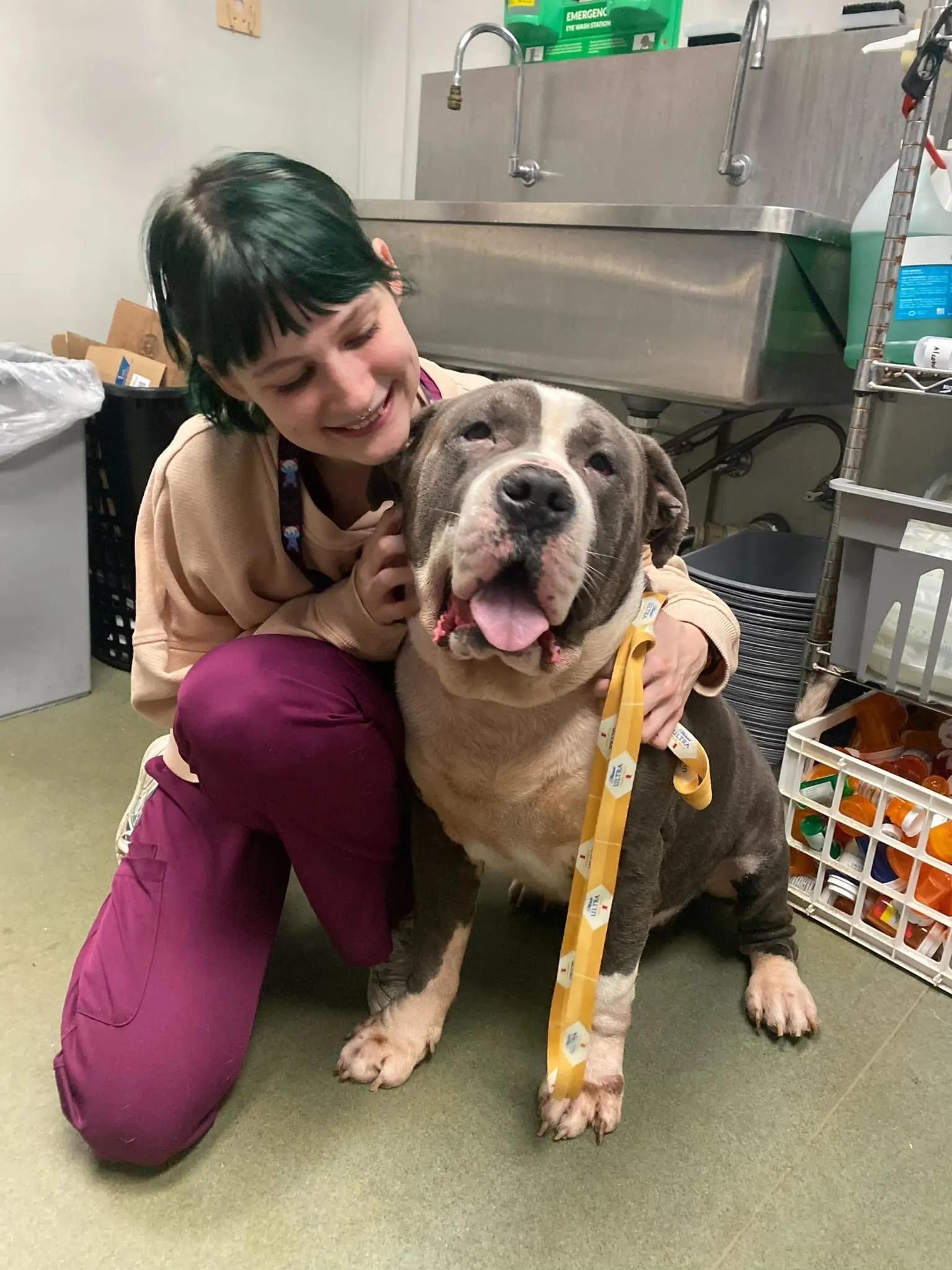 woman and happy dog