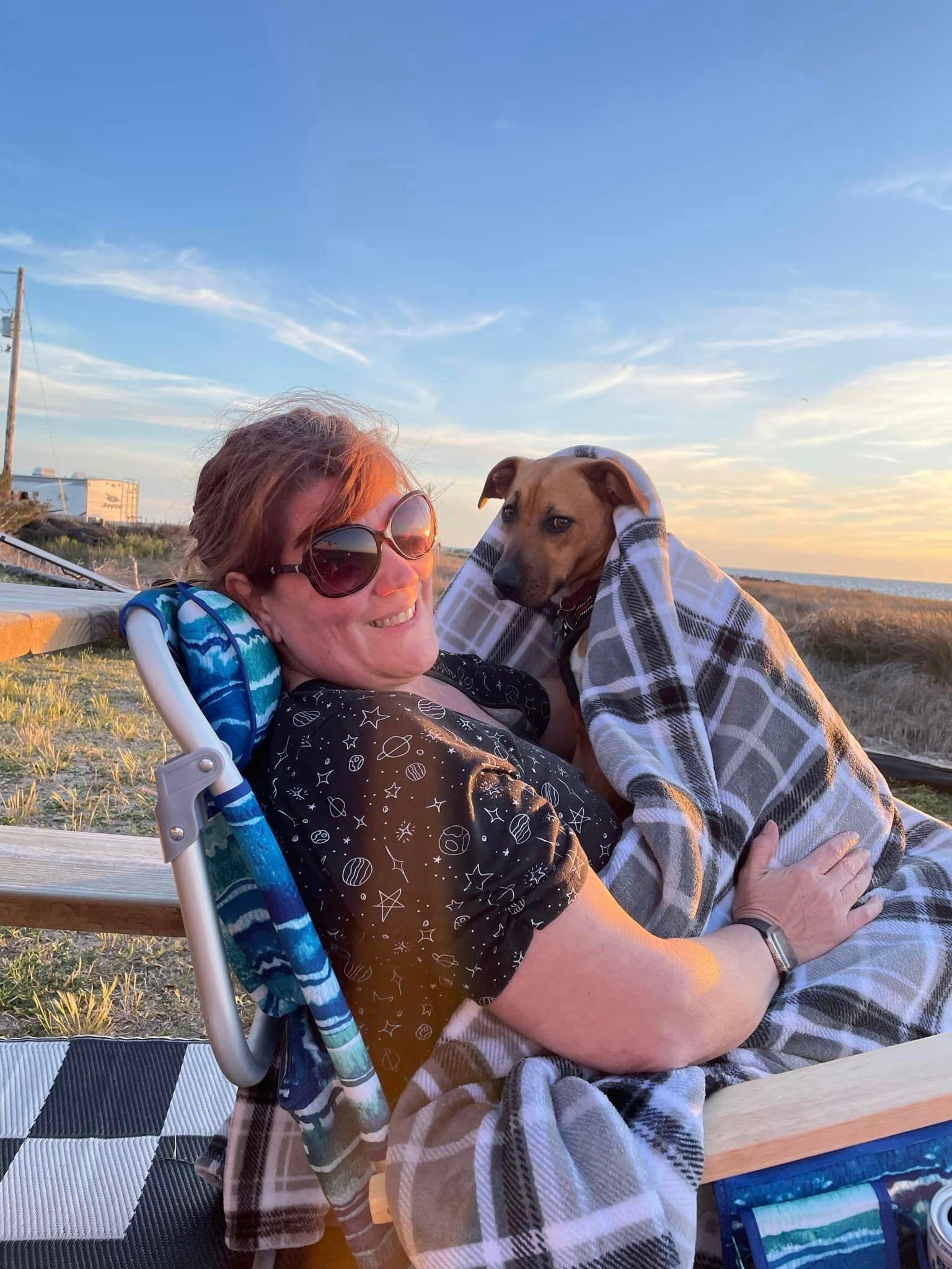 woman dog and sunset