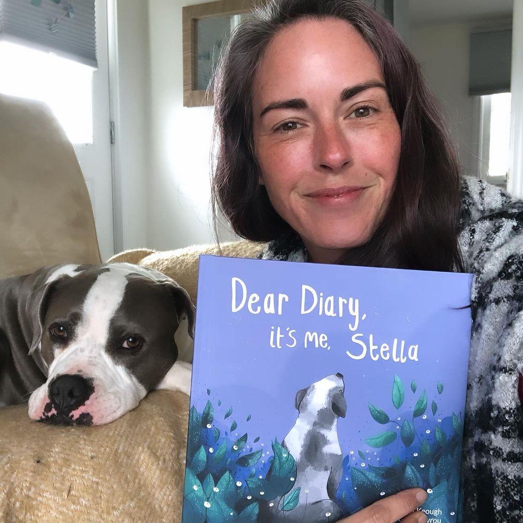 woman dog and book