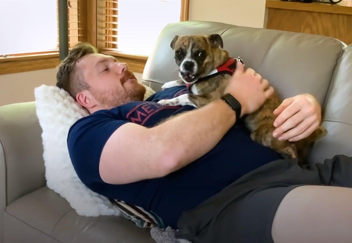 mica with her new dad cuddling on the couch mica with her new dad cuddling on the couch