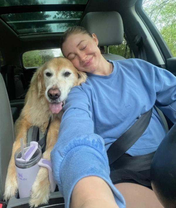 selfie of golden retriever with his rescuer