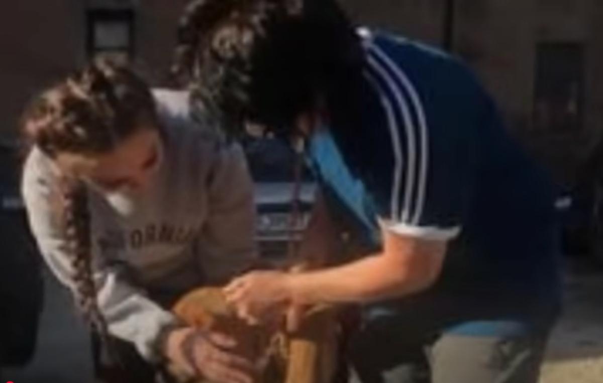 women peting the mama dog