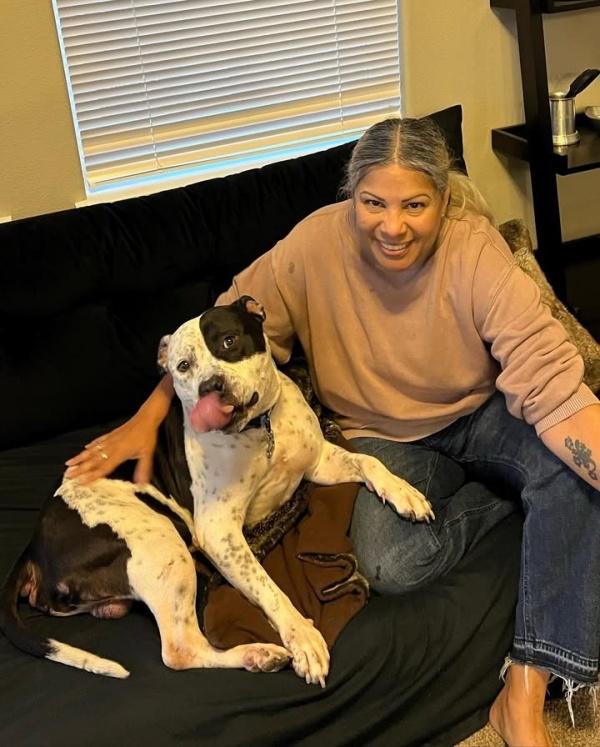 bubba lying on the couch with his mom