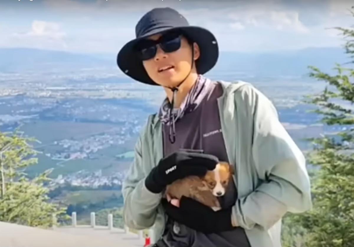 rescuer going on adventure with his new dog